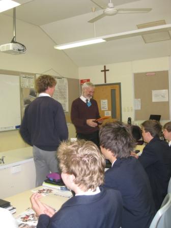 Steve being presented with gift of appreciation from one of the students for his presentation